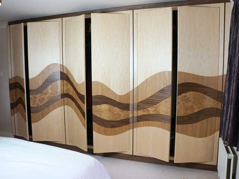 Bespoke Fitted bedroom wardrobe with wave design
