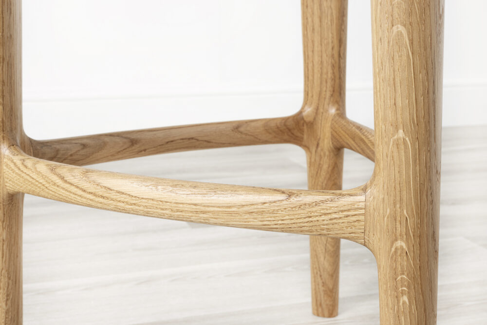 oak bar stool with integrated wooden footrest