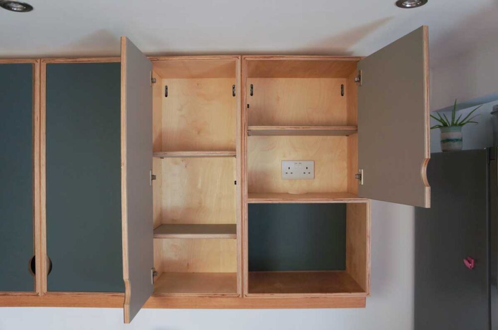 Lino and plywood kitchen by Dovetailors - adjustable shelves