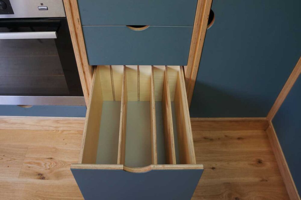 Lino and plywood kitchen by Dovetailors - deep drawer dividers