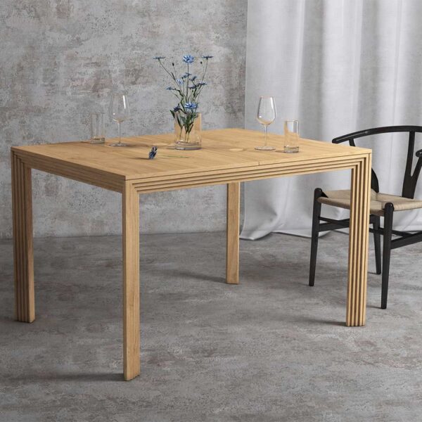 Contemporary rectangular extending dining table in oak
